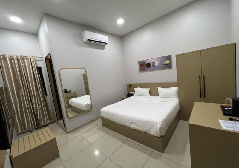 Ixoras Hotel Victoire Kinshasa Buitenkant foto